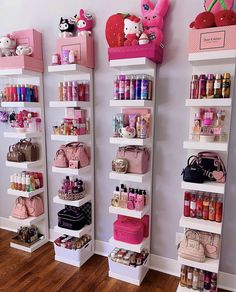 the shelves are filled with many different types of cosmetics and handbags, along with hello kitty bags