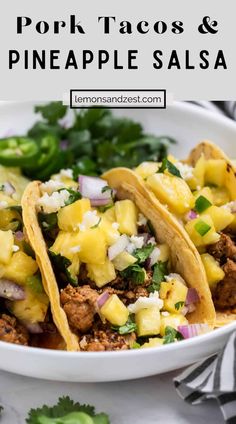 pork tacos and pineapple salsa in a white bowl