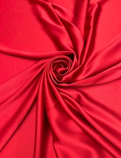 the red fabric is very soft and shiny