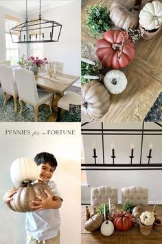 a boy holding a large pumpkin in front of a dining room table with other decorations