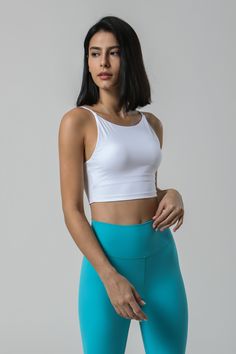 75% Nylon . 25% Spandex Soft. comfortable. skin friendly 4-way stretch. breathable and sweat-wicking Cut-out design provides a breezy feel and stylish look Built-in Bra with Removable Pads Perfect for both sports activities and daily life Yoga Tank Top, Strapless Bandeau, New Cut, Yoga Tank, Yoga Tank Tops, Yoga Set, Cut Out Design, Sports Activities, Plus Size Swimwear