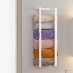 a towel rack with towels hanging on it