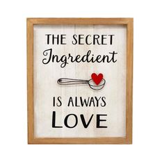 a sign that says the secret ingredient is always love with a spoon and heart on it