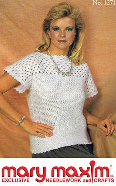 a woman wearing a white top with crochet on the sleeves and neckline