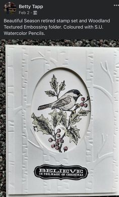 a white card with a bird on it