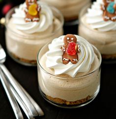 small desserts with frosting and decorated gingerbread cookies