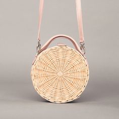 Elevate your summer style with our handmade natural material round straw handbag. Crafted with exceptional attention to detail, this handbag is perfect for stylish women who appreciate minimalistic accessories. The round shape and natural pearls add a unique touch, while the use of natural materials showcases our commitment to sustainability. Treat yourself or surprise a loved one with this summer must-have! 100% natural straw  natural linen lining  shoulder strap which you can take off inside p Trendy Natural Shoulder Bag For Picnic, Spring Straw Crossbody Beach Bag, Trendy Natural Colored Bag For Picnic, Trendy Natural Color Bag For Picnic, Trendy Natural Color Picnic Bag, Trendy Natural Straw Bag With Adjustable Strap, Spring Rattan Bag With Adjustable Strap, Trendy Woven Straw Bag For Picnic, Summer Straw Crossbody Bag For Spring