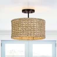 a chandelier hanging from the ceiling in a living room