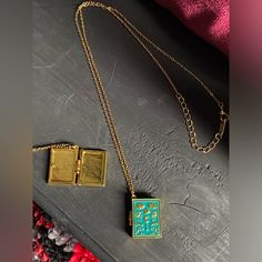 18k Gold Plated Gold Brass Amulet Locket Necklace, Gold Rectangular Pendant Jewelry For Gift, Gift Amulet Charm Necklaces With Locket, Green Vintage Charm Jewelry Gift, Green Vintage Charm Jewelry For Gift, Yellow Gold Amulet Locket Necklace As Gift, Gold Rectangular Pendant Jewelry Gift For Her, Gold Rectangular Pendant Jewelry As Gift For Her, Gold Rectangular Pendant Necklace For Keepsake