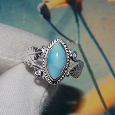 "This handcrafted jewelry is made by ShalzDesigns . For each piece , we handpick the best gemstone and ensure high quality craftsmanship and intrinsic designing. Buy it for yourself of for your loved ones. Ocean Larimar Ring, High Quality Larimar Ring, Dainty Ring, Sterling Silver Ring, Designer Ring, Women Ring, For Her, Birthday Gift, JPY915 Gemstone - Larimar  Weight - 4.8gm Stone size - 5x10mm Metal - Sterling Silver Purity of Silver: 92.5% Pure, Solid, Sterling Silver We take 3 to 5 days to Bohemian Larimar Ring As A Gift, Handmade Turquoise Larimar Ring For Anniversary, Larimar Turquoise Gemstone Ring For Anniversary, Turquoise Larimar Ring Gift, Larimar Turquoise Ring Gift, Gift Turquoise Larimar Ring, Larimar Turquoise Ring Gemstone Gift, Turquoise Larimar Ring As Gift, Turquoise Larimar Ring For Gift