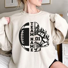 Custom Football Sweatshirt | Personalized Soccer Team Name & Number | Gift for Football Mom Show off your team spirit with our Custom Football Sweatshirt! Perfect for both men and women, this personalized sweatshirt can feature your school soccer team name and number, making it a great gift for football moms, dads, or any fan. Ideal for birthdays, game days, or just cheering from the sidelines, this sweatshirt combines comfort and style for every football lover. Custom Football Sweatshirt, Football Mom Gift, Team Name Sweatshirt Hi! Welcome to✨Northstar ✨ ✨As the weather gets colder, you want clothes that keep you and your body warm. Here, Northstar  is ready to keep you warm with its unique designs..✨ ✨Product Features✨ 👉Medium-heavy fabric (8.0 oz/yd² (271.25 g/m 👉Loose fit 👉Runs true Crew T-shirt For Sports Events, Fan Gear Crew Neck With Team Logo, Fan Gear Crew Neck With Team Logo Sublimation Design, Fan Gear Sublimation Crew Neck With Team Logo, Varsity Crew Neck T-shirt For Team Events, Football Season Long Sleeve T-shirt With Team Logo, Long Sleeve Football Season T-shirt With Team Logo, Long Sleeve T-shirt With Team Logo For Football Season, Crew Neck Sublimation Design With Team Logo For Fans