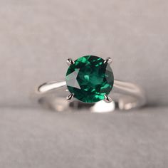 * A Classic 4 Prongs Round Cut Emerald Ring * An Infallible Choice for Anniversary, Engagement, Birthday and Daily Occasion. ◆ Production Description: Main stone Type: Emerald Main Stone Shape: Round Cut Main Stone Size: 8*8mm Side stone: NONE Metal: 925 Sterling silver - Other options available in the drop down menu ◆ Customization: √Free for Add Engraving √Other Metal Type Available √Other Gemstones & Shapes Available √Personalization Requests Available ◆ Packaging: To give you a complete Green Solitaire Crystal Ring, Round Emerald Ring With Vvs Clarity As Gift, Solitaire Crystal Ring For May Birthstone, May Birthstone Solitaire Crystal Ring, Classic Crystal Ring With May Birthstone, Classic Crystal Ring For May Birthstone, Classic Crystal May Birthstone Ring, Emerald Promise Ring With Vs Clarity, Minimalist Round Crystal May Birthstone Ring