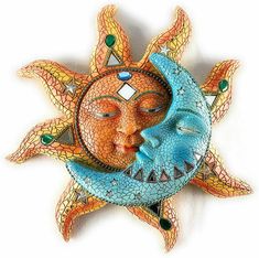 a sun and a moon face together on a white background