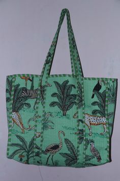 cotton quilted Jhola Bag made by Indian Artisans, this quilted shopping bag is totally unique and multi purpose. Use this for your grocery or as a travel bag. Perfect to suit all. Size in Inch:- Height-19" inch Width- 25" inch Handle-11" inch Size In CM:- 40x40x13 cm Handle height- 35 cm INSIDE POCKET - Pocket size - 17cm x 14cm. Material: Cotton Pattern: Quilted Style: Ethnic Style: Tote Bag Product Work: Printed & quilted Stitched Usage : Cosmetic, Make-up, Travel, Toiletries, Medicine, Accessories, Shopping and much more. Perfect for Beach Visits/ Quick Grocery runs/ Carrying Kids items/ Artist Paint book and Paints /Extra Bag Washable on Cold / Delicate wash Make a good Sustainable Gift . Wash Care Instructions:- Dry clean only Thank you for Visiting on my shop. Green Quilted Shopping Bag, Green Quilted Rectangular Bag, Green Quilted Tote Shoulder Bag, Green Rectangular Cotton Beach Bag, Traveling Bag, Sac Week End, Bag Summer, Weekend Bag, Painted Books