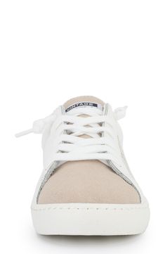 A sporty sneaker features a star logo and eye-catching panels for chic style. 1" platform Round toe Lace-up vamp Synthetic upper, lining, manmade sole Imported