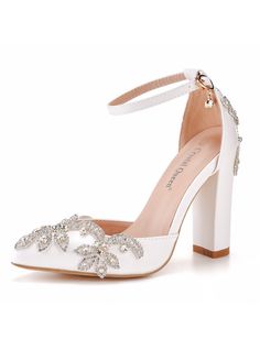 Elevate your formal look with these Rhinestone Ladies Shoes. These shoes feature a high square wedge heel, a pointed toe and heel adorned with hanging jewels and crystal rhinestones, and an ankle strap closure for a secure fit. The insole is made of PU for added comfort and the upper is crafted from high-quality PU material. With a true-to-size fit and a buckle strap closure, these shoes are the perfect addition to your formal attire. The rubber sole provides stability and durability, making the Wedding Bride Shoes, Rhinestone Wedding Shoes, Thick High Heels, Shoes 2022, Wedding Shoes Bride, Modern Sandals, White Wedding Shoes, Wedding Shoes Heels, Rhinestone Sandals