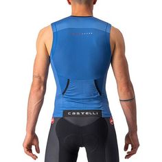 We count on quick-drying, speedy tops for our triathlons, and with Castelli, that's the Free Tri 2 Sleeveless Top. It's comfortable on the run and keeps us cool in hot weather. Back mesh fabric offers maximum breathability, and two large rear pockets hold essential items. SnapLock fasteners clip onto Castelli shorts to prevent the top from riding up during our swim, and a full-length zipper gives us total control over ventilation. Man Bike, On The Run, Essential Items, The Run, Hot Weather, Triathlon, In Hot, Mesh Fabric, Athletic Tank Tops