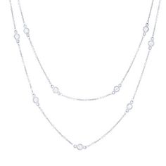 A staple in any jewelry collection this necklace features round brilliant cut diamonds in bezel stations. Classic Sterling Silver Necklace With Bezel Setting, Classic Bezel-set Cubic Zirconia Necklace, Elegant Round Bezel Setting Tennis Necklace, Classic Diamond White Necklace With Bezel Setting, Dazzling Necklace With Bezel Setting And Round Cut, Timeless Sterling Silver Diamond Necklace With Bezel Setting, Classic Sterling Silver Diamond Necklace With Bezel Setting, Elegant Bezel Set Tennis Necklace, Dazzling Round Cut Necklace With Bezel Setting