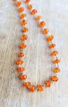 Carnelian Gemstone Beaded Choker Necklace Sterling Silver, Dainty Necklace, Minimalist Necklace, Layering Necklace, Virgo Zodiac Crystals If you love the color orange, you'll love this carnelian gemstone beaded necklace! It is a great necklace to wear in the summer and transition into the fall. Orange pairs beautifully with shades of blue and turquoise. Wear it alone or layer it with your other sterling silver jewelry! The total length of the necklace is approximately 16 inches. The faceted rond Orange Agate Gemstone Necklace, Faceted Amber Round Bead Jewelry, Amber Gemstone Beads Rondelle Jewelry, Amber Rondelle Gemstone Beads Jewelry, Orange Faceted Beads Jewelry For Gift, Orange Faceted Beads For Jewelry Making, Orange Faceted Beads Jewelry, Orange Faceted Beads For Crafting, Orange Round Faceted Beads Jewelry