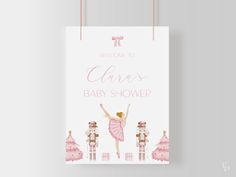 a welcome sign for a baby shower with a ballerina in pinks and golds