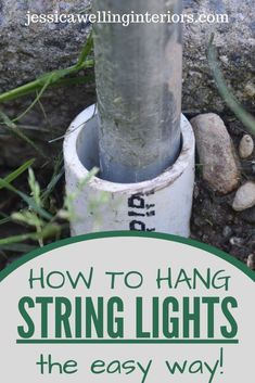 a post with the words easy diy string light posts in front of rocks and grass