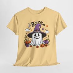 You'll LOVE this super-soft, high-quality t-shirt made just for you. Spooky Ghost - Unisex Heavy Cotton Tee, Halloween shirt, perfect for the spooky season vibes. This classic fit tee is comfortable and versatile, suitable for casual or semi-formal occasions. It is made with high-quality materials for sustainability and durability. Ideal for those who love Halloween or enjoy adding a touch of spookiness to their wardrobe. Gildan 5000 Super-Soft, Ultra-Durable T-Shirt - Unisex Fit - 100% grown and harvested cotton. - Classic fit - Tear-away label - Runs true to size - Please see the size chart in each listing for more details.   - Each item is made to order and shipped in 1-5 Days.   - Please message me if you have any questions! - Thanks so much!! Cute Halloween Costume, Halloween Party Outfit, Ghost Graphic, Halloween Party Outfits, Spooky Ghost, Ghost Shirt, Cute Halloween Costumes, High Quality T Shirts, Cute Halloween