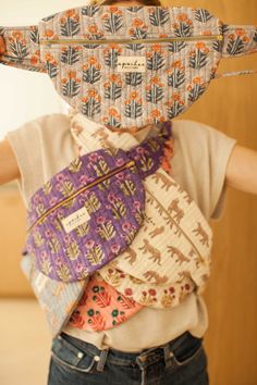 a young boy wearing a neck tie made out of cloth