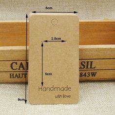 a brown cardboard box with measurements for the handle