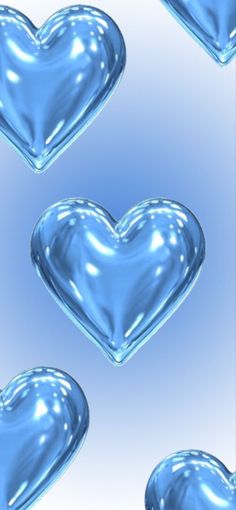 several shiny blue hearts on a white background