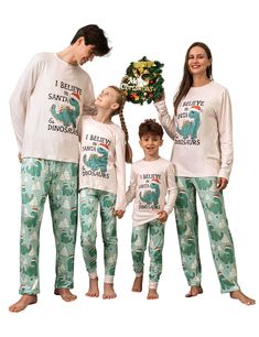 the family is wearing matching pajamas