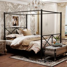 a bed room with a neatly made bed and a chandelier