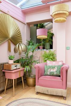 there are two pictures one is pink and the other is green, both have plants in them