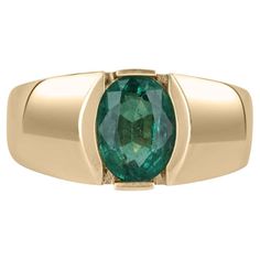 This is a simple and sophisticated unisex emerald ring. The emerald carries a full 2.08-carats and showcases a dark green color, with a bluish-green undertone. It is set in a simple and secure, 14k yellow gold tension setting. The perfect everyday/pinky ring. Setting Style: Solitaire/Tension Metal Purity: 14K Yellow Gold Weight: 6.9 Grams Main Stone: Emerald Shape: Oval Cut Approx Weight: 2.08-carats Clarity: Transparent Color: Green Luster: Excellent-Very Good Treatment: Natural, Oiling Origin: Emerald Mens Ring, Tension Setting, Dark Green Color, Colombian Emeralds, Emerald Engagement, Bluish Green, Mens Ring, Ring Setting, Ring Oval