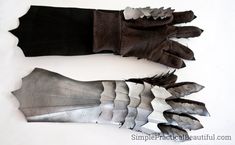 an image of gloves made out of silver and black material