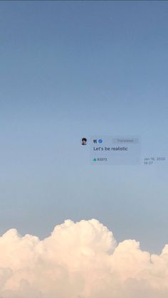 an airplane flying in the sky with clouds below it and two tweets above