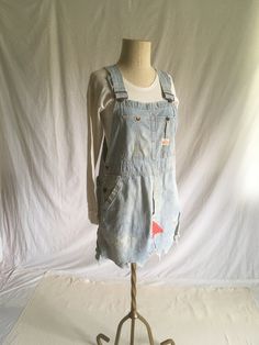 "vintage 1960s cut off overalls custom dress Penney's Payday Vest Bak hickory stripe cotton adjustable straps donut hole fly red patched authentic age wear- fray, fade, rips, button replaced on right waist measures, lying flat, bib top width-10\" bib length-10 1/2\" waist-17 1/2\" hip-21 1/2\" total length-31\" at shortest hem area and adjustable w/straps" Cotton Shortalls With Frayed Hem For Spring, Spring Cotton Shortalls With Frayed Hem, Cotton Overalls With Frayed Hem, Cotton Overalls With Frayed Hem For Spring, Spring Cotton Overalls With Frayed Hem, Vintage Cotton Shortalls For Spring, Vintage Sleeveless Overalls With Pockets, Vintage Bib Front Overalls For Summer, Vintage Fitted Shortalls For Spring