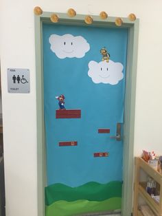 a door decorated to look like mario kart is coming out of the sky with his arms in the air