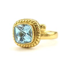 This genuine blue topaz square gemstone is set in an alchemía ring setting that is adjustable. Alchemía is a blend of base metals that have the look of 18k gold. Style Number: 16138 Metal: Alchemía Gemstone: Genuine Blue Topaz Dimensions: 1/2 inch wide Handmade in Mexico Square Ring, Square Rings, Ring Setting, Gold Style, Base Metal, Blue Topaz, Ring Sets, Topaz, Gemstone Rings