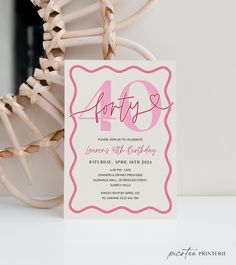 a pink and white birthday party card with the number forty