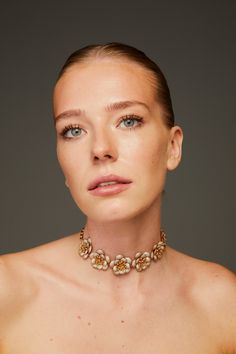 Luxury Bronze Metal Jewelry, Designer Gold Brass Jewelry, Designer Brass Jewelry For Formal Occasions, Luxury Gold Choker For Evening, Luxury Gold Evening Choker, Glamorous Gold Choker For Evening, Designer Jeweled Jewelry Gift, Designer Gold Necklaces For Evening, Luxury Crystal Choker Jewelry