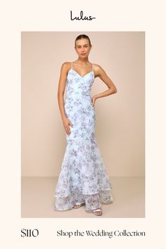 a woman in a white dress with flowers on it and the words shop the wedding collection