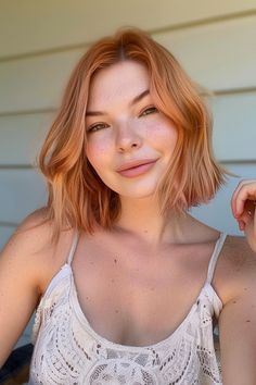 Are you ready to ignite your style and turn heads wherever you go? Look no further than the captivating allure of strawberry blonde hair. This enchanting shade, a perfect blend of red and golden hues, Strawberry Blonde Hairstyles, Beige Highlights, Barrel Curls, Dark Roots Blonde Hair