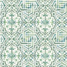 a green and white wallpaper with an intricate design