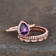 This is 3pcs Amethyst wedding ring set with CZ in 925 sterling silver. This ring is marked 925 Main stone is 6x8mm,about 1.2ct. Two Art Deco Wedding Bands with cz stones. I accept custom making order.Please contact me if you need this service. All the jewelry in my store is handmade.It may take 2-3 weeks to finish. For all the jewelries,there is a 14 days money back guarantee.You can return it in the time frame without any questions.However there maybe handcrafted fee and shipping fee deducted f Elegant Amethyst Stackable Wedding Rings, Teardrop Amethyst Wedding Ring, Teardrop Amethyst Ring For Wedding, Elegant Purple Stackable Rings For Wedding, Wedding Amethyst Stackable Rings Fine Jewelry, Purple Amethyst Stackable Wedding Rings, Fine Jewelry Amethyst Stackable Wedding Rings, Purple Gemstone Stackable Rings For Wedding, Wedding Amethyst Gemstone Stackable Rings