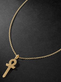 Stephen Webster's necklace is strung with an intricately engraved Ankh pendant, the ancient Egyptian hieroglyphic that symbolises life. It's crafted from polished 18-karat gold and has a long 30-inch chain that'll layer nicely with shorter styles. Symbolic Yellow Gold Ceremonial Necklace, Symbolic Ceremonial Etched Necklaces, Symbolic Etched Necklaces For Ceremonial Occasions, Symbolic Etched Necklaces For Ceremonial Use, Amulet Style Ankh Necklace In Brass, Gold Ankh Necklace For Ceremonial Occasions, Ceremonial Ankh Amulet Necklace, Luxury Gold Ankh Jewelry, Symbolic Gold Plated Engraved Necklaces