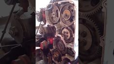 an image of the inside of a car engine with gears and gear attached to it