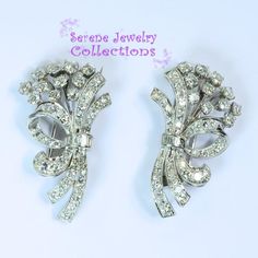 Beautiful pair of diamond platinum vintage brooches! Elegant flower bouquet design with 7.26 carats of white sparkly diamonds!Weight: 18.33 gramsSize: 1.5 inch x 1 inchPrecious Metal: PlatinumPrecious stones:-Diamond Rounds: 7.26 carats total Vintage Brooches With Brilliant Cut Diamonds, White Brilliant Cut Brooches For Wedding, White Brilliant Cut Wedding Brooches, Vintage Platinum Brooches For Wedding, Platinum Brooches With Diamond Accents For Wedding, Wedding Platinum Brooches With Single Cut Diamonds, Wedding Brooches With Diamond Accents In Platinum, Elegant Flower Bouquet, Flower Bouquet Design