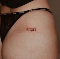 Writting Tattoo Ideas Female, Tattoo Ideas Female Ear Back, Angel Text Tattoo, Spanish Tattoo Ideas, Angel Hip Tattoo, Angel Word Tattoo, Tattoo Ear, Wing Tattoo Men, Daddy Tattoos