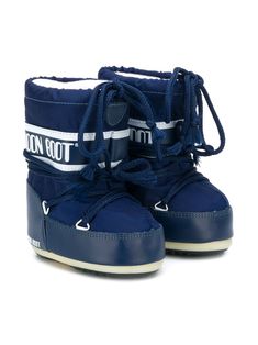 Blue Nylon Sneakers With Round Toe, Blue High-top Winter Boots, Sporty Blue High-top Boots, Winter Sports Blue Sneakers, Blue Winter Sports Sneakers, Winter Sports Boots With Laces, Waterproof Blue Sneakers With Round Toe, Blue Waterproof Sporty Boots, Blue Insulated Boots For Outdoor Activities