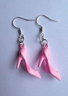 Cute & kitsch pink doll shoes earrings Metal shoes with colour coating and silver plated hook earrings Shoe length: 2.5cm Pink Plastic Earrings For Party, Pink Plastic Party Earrings, Cute Plastic Party Earrings, Pink Plastic Drop Earrings, Metal Shoes, Pink Doll, Earrings Metal, Pink Shoes, Doll Shoes